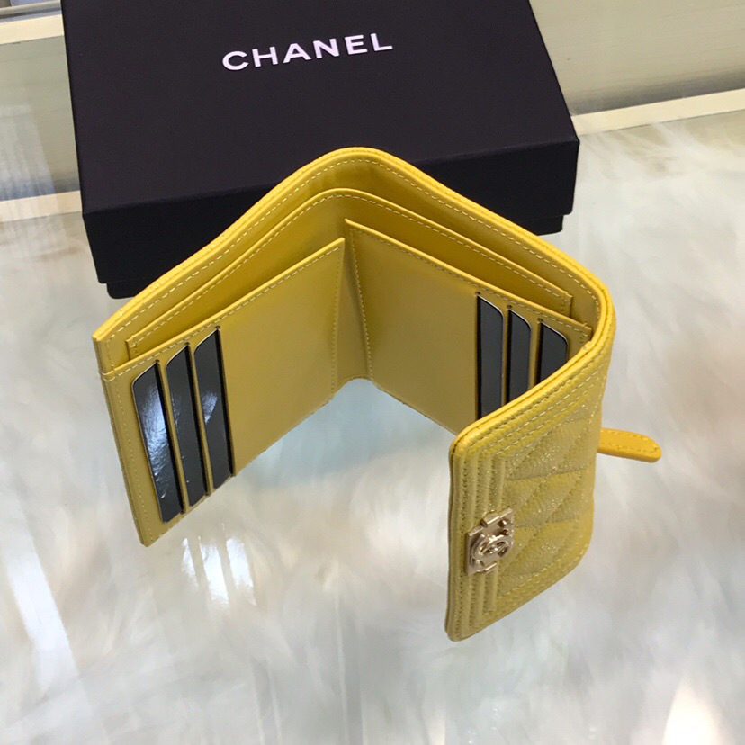 Ch**el Lebay Calfskin Leather Plain Folding Yellow Wallets