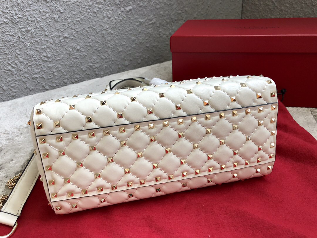 Va1e*ntin0 Garavani Rockstud Spike Lambskin Handbag in white
