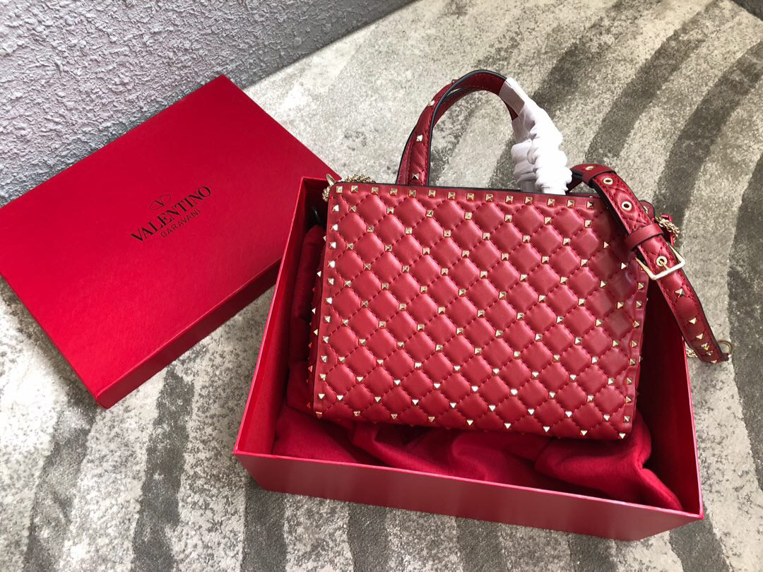 Va1e*ntin0 Garavani Rockstud Spike Lambskin Handbag in Red