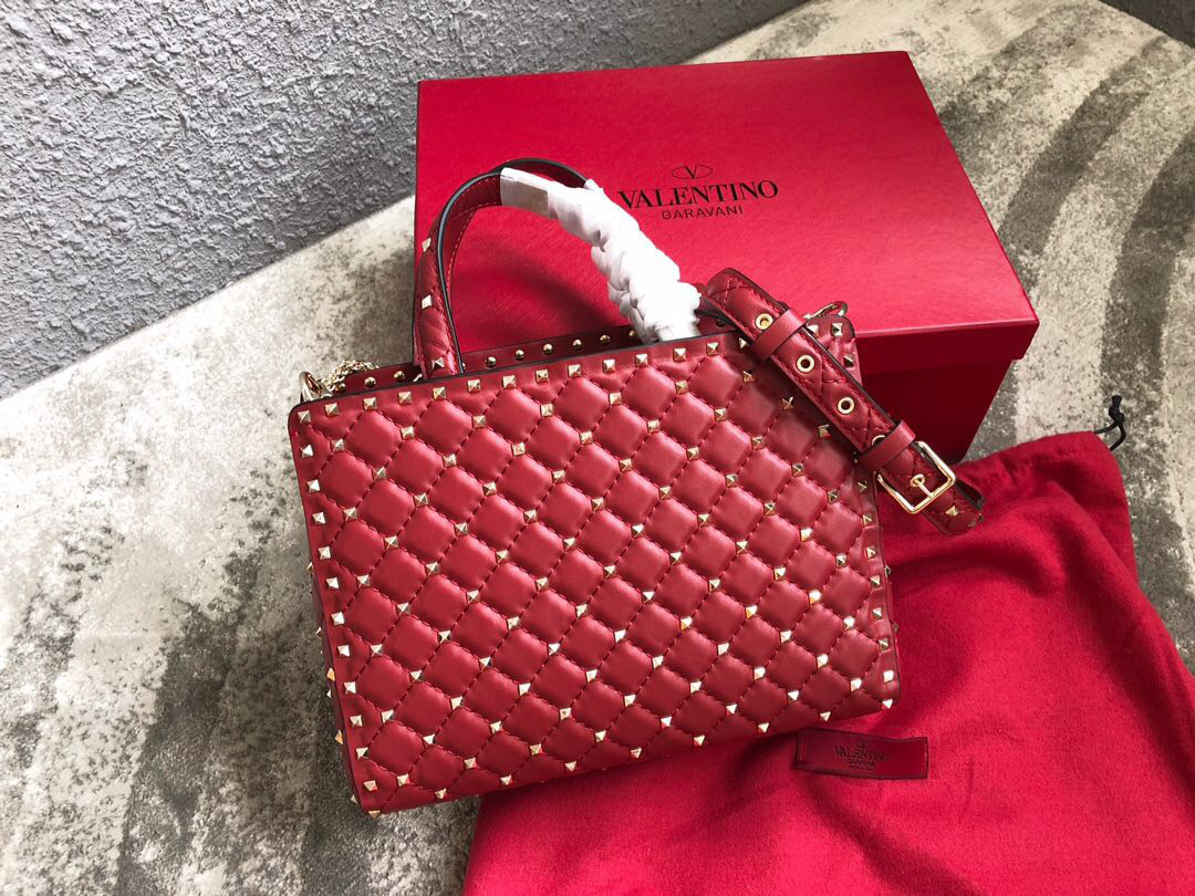 Va1e*ntin0 Garavani Rockstud Spike Lambskin Handbag in Red