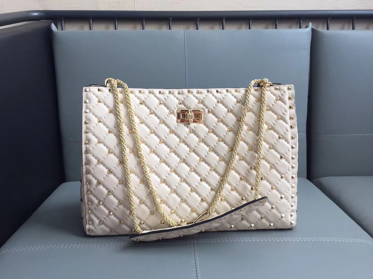 Va1e*ntin0 original lambskin spike tote bag in White