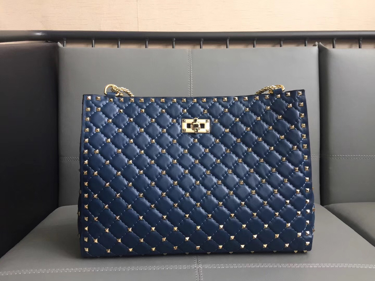 Va1e*ntin0 original lambskin spike tote bag in Blue