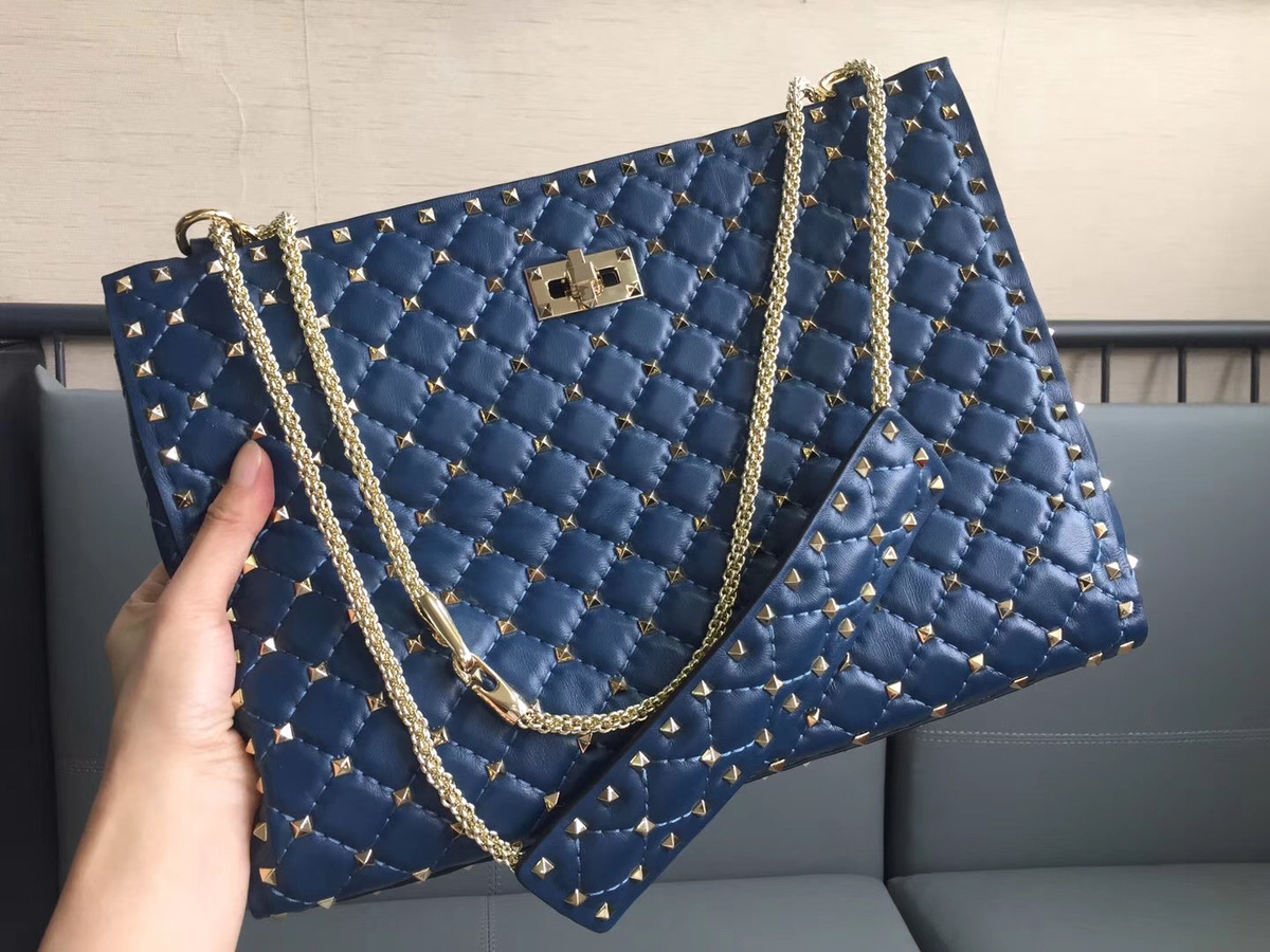 Va1e*ntin0 original lambskin spike tote bag in Blue