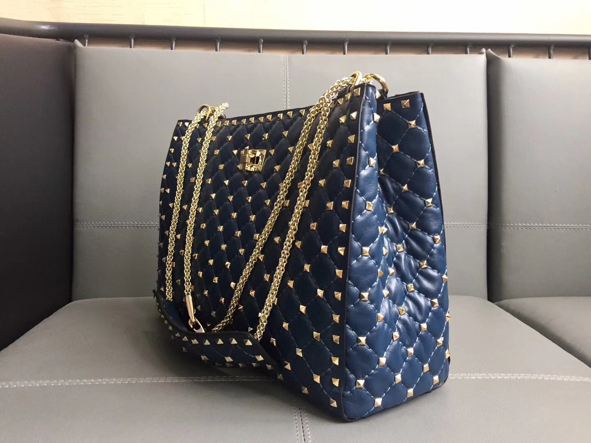 Va1e*ntin0 original lambskin spike tote bag in Blue