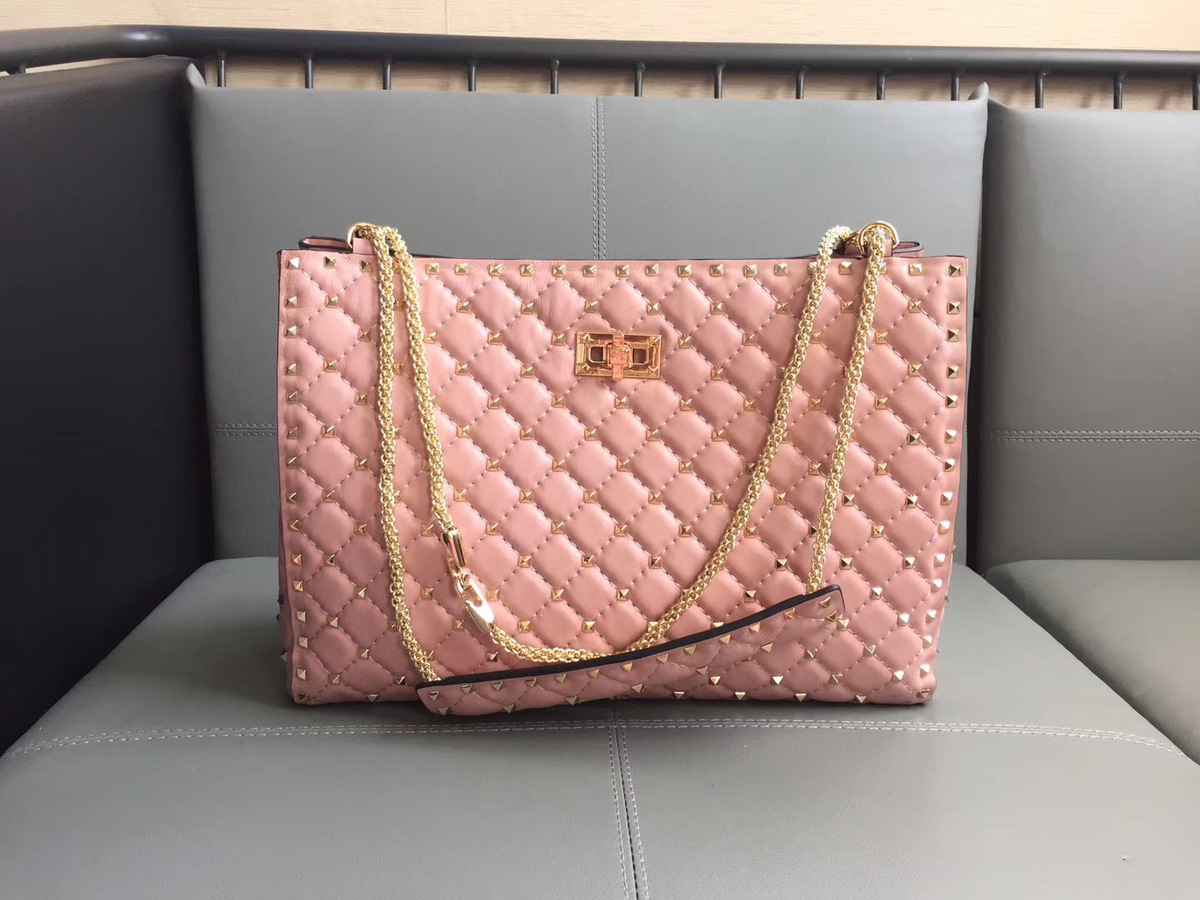 Va1e*ntin0 original lambskin spike tote bag in Pink