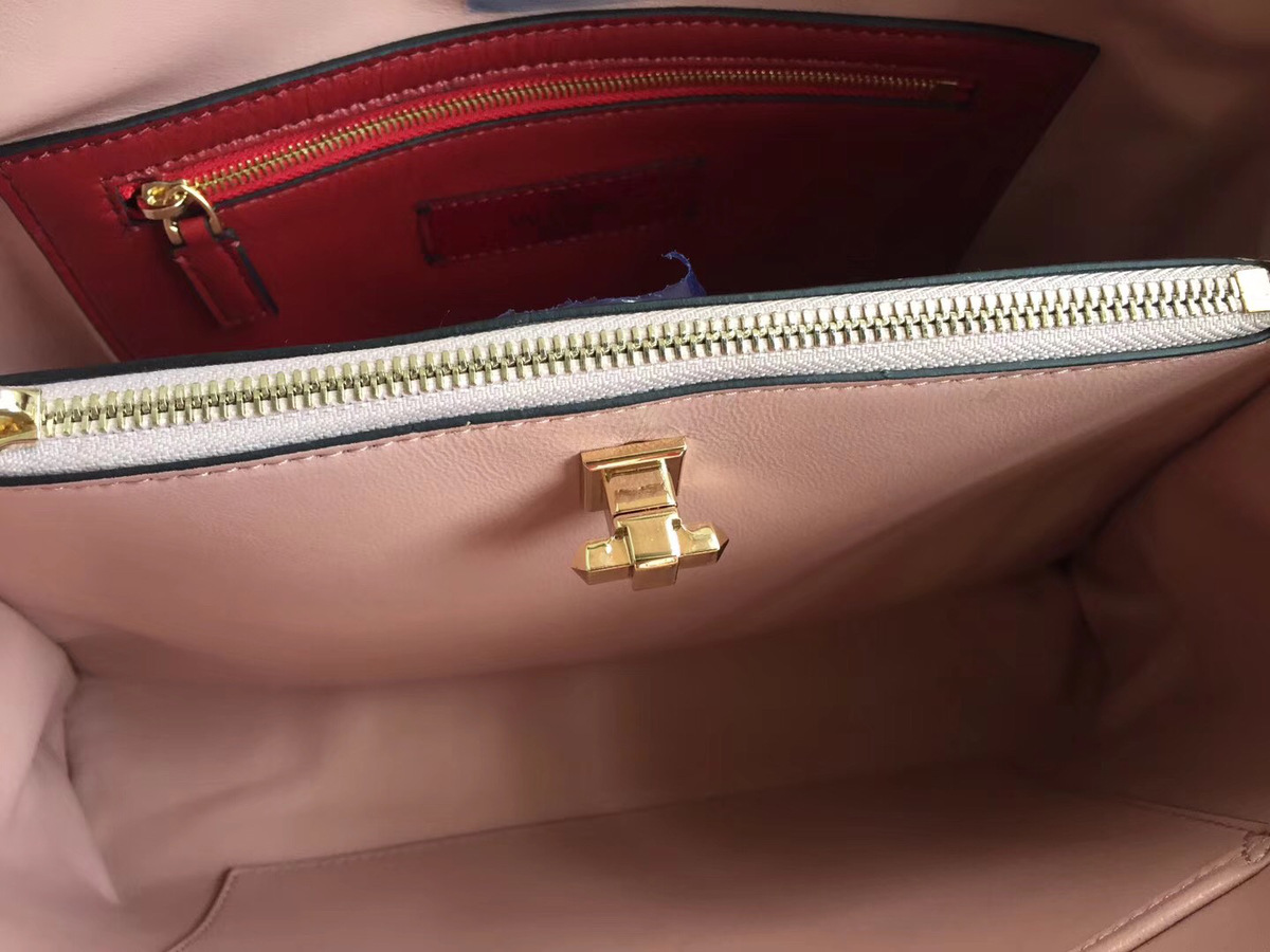 Va1e*ntin0 original lambskin spike tote bag in Pink