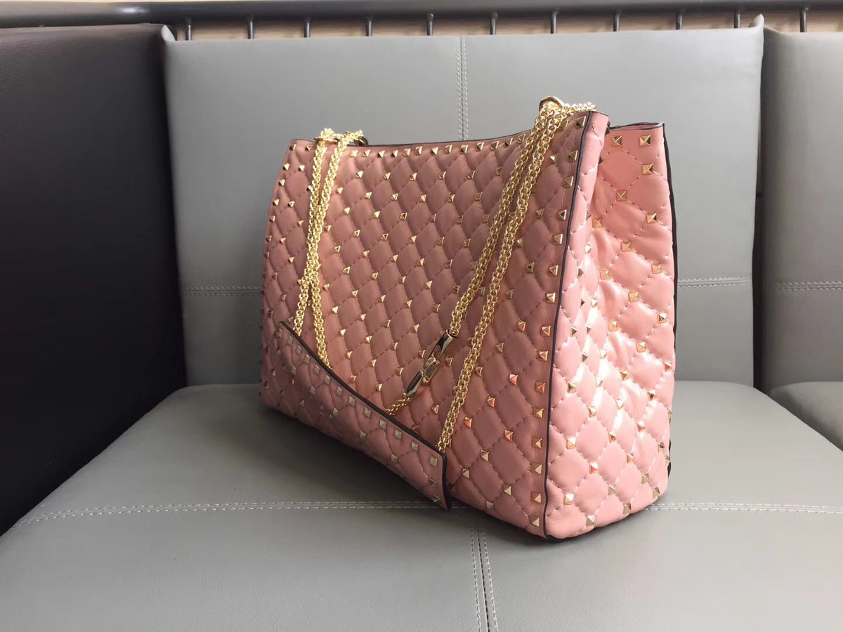 Va1e*ntin0 original lambskin spike tote bag in Pink
