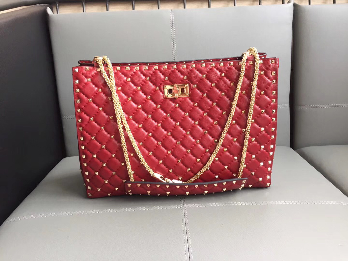 Va1e*ntin0 original lambskin spike tote bag in Red