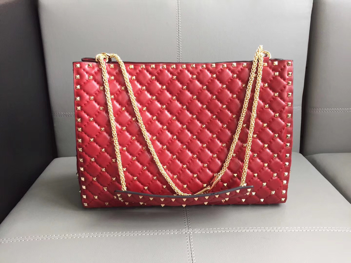 Va1e*ntin0 original lambskin spike tote bag in Red