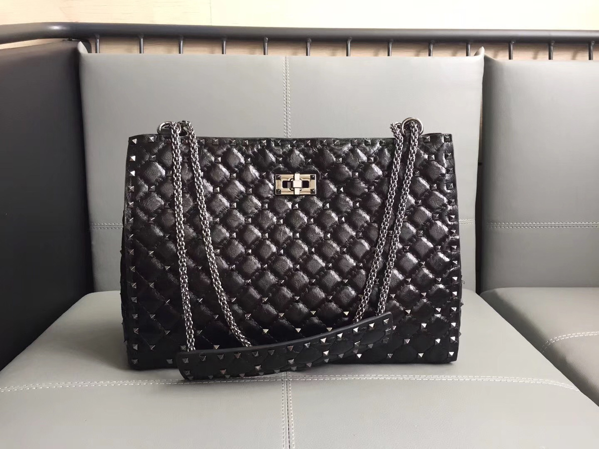 Va1e*ntin0 original lambskin spike tote bag in Black