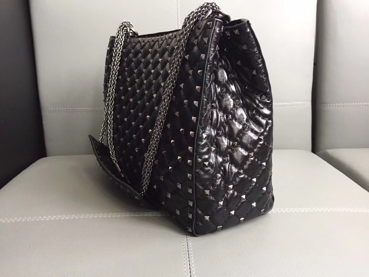 Va1e*ntin0 original lambskin spike tote bag in Black