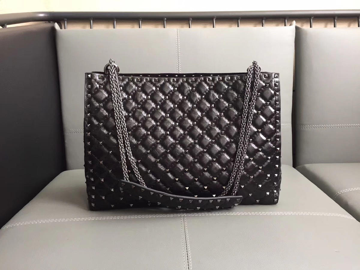 Va1e*ntin0 original lambskin spike tote bag in Black