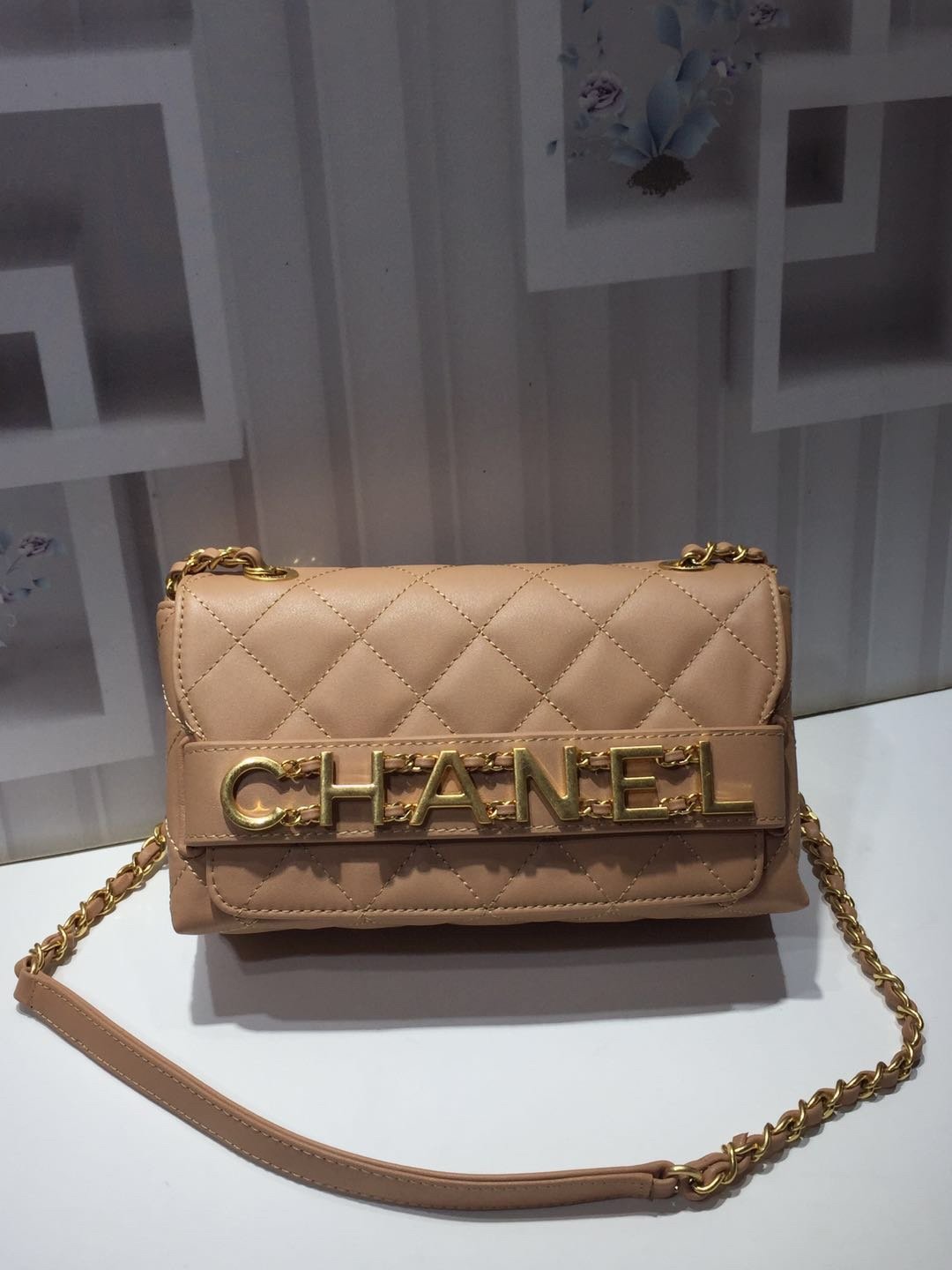 Ch**el small flap bag calfskin goldtone metal beige