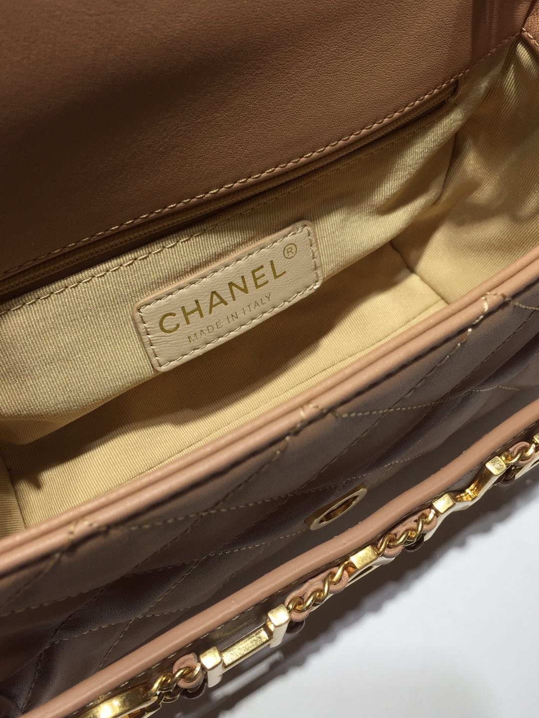 Ch**el small flap bag calfskin goldtone metal beige