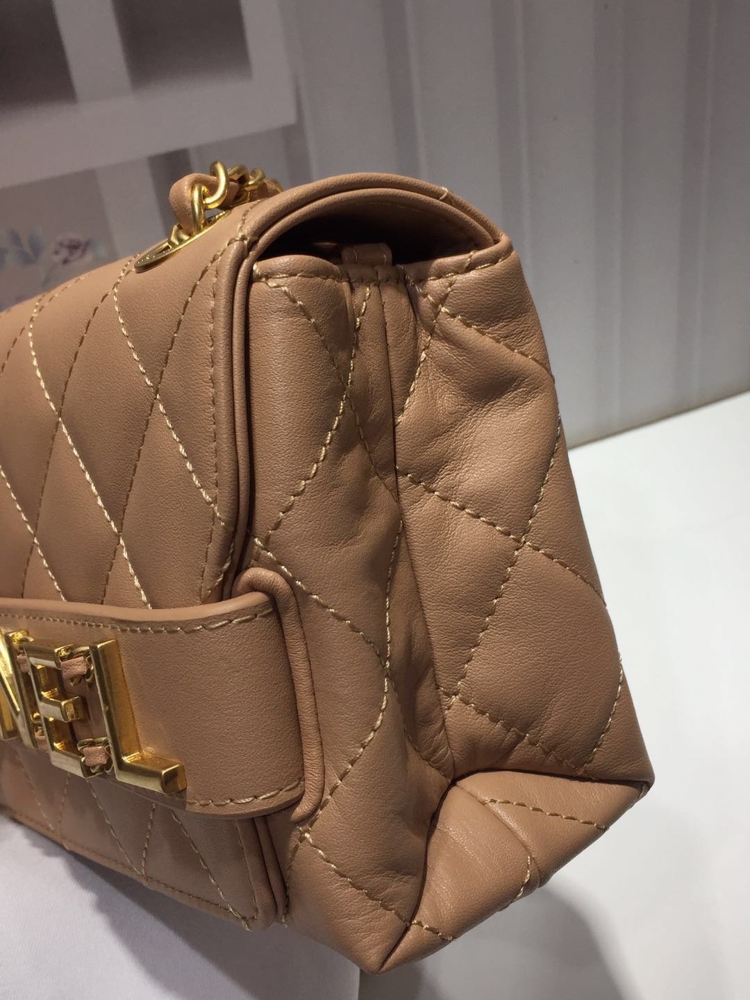 Ch**el small flap bag calfskin goldtone metal beige