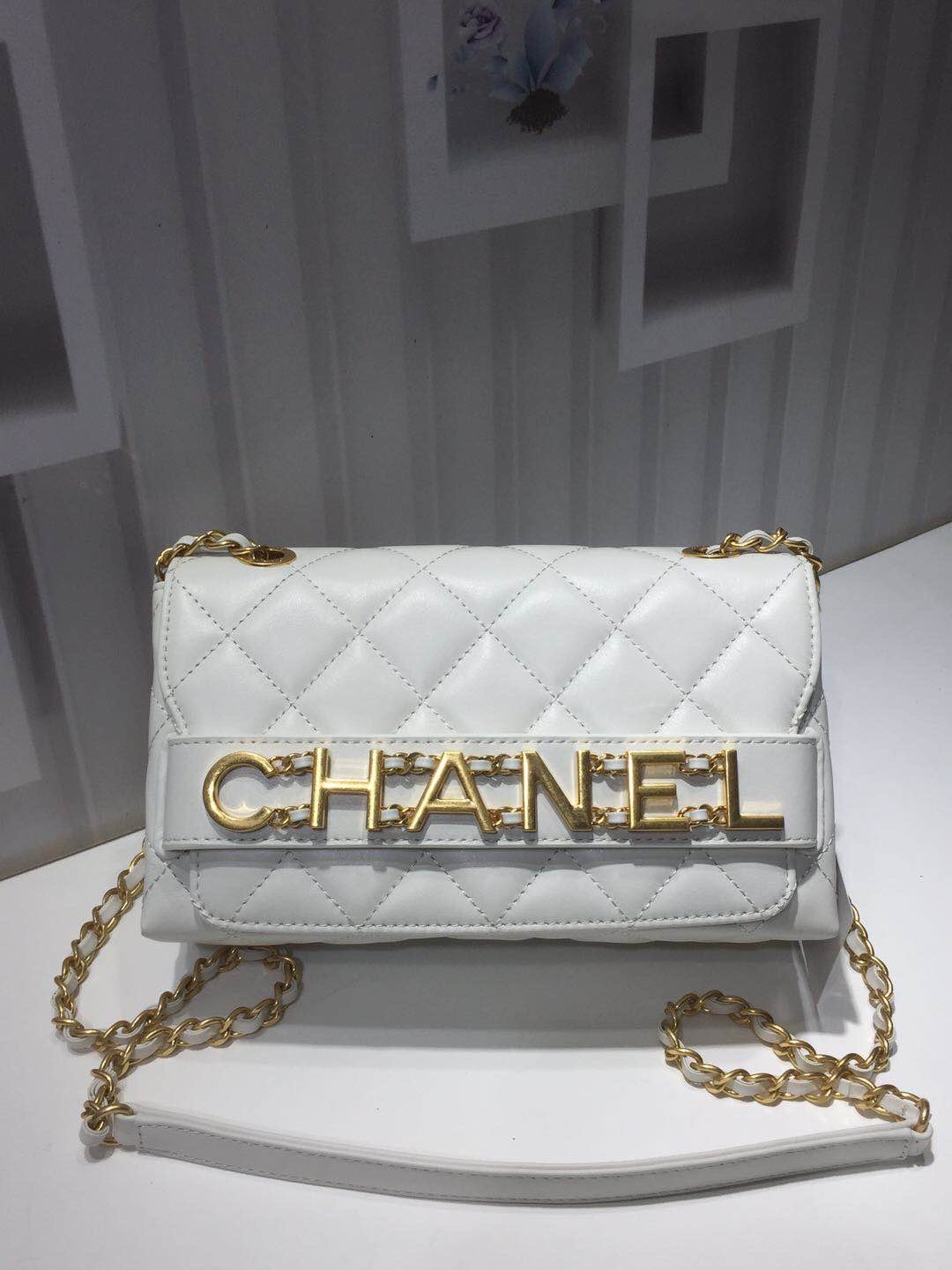 Ch**el small flap bag calfskin goldtone metal white