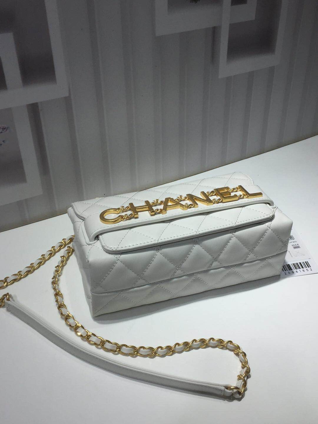 Ch**el small flap bag calfskin goldtone metal white