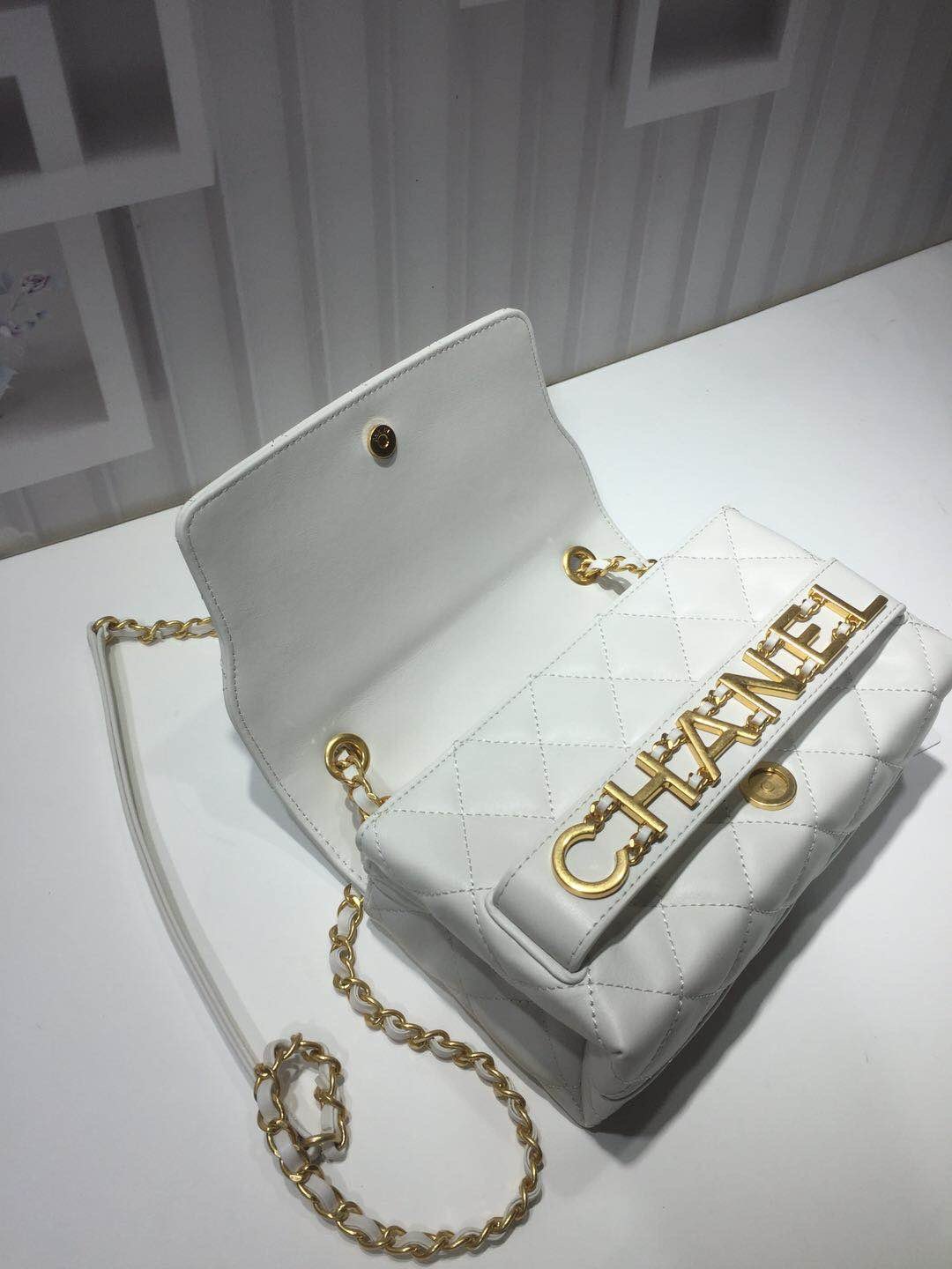 Ch**el small flap bag calfskin goldtone metal white
