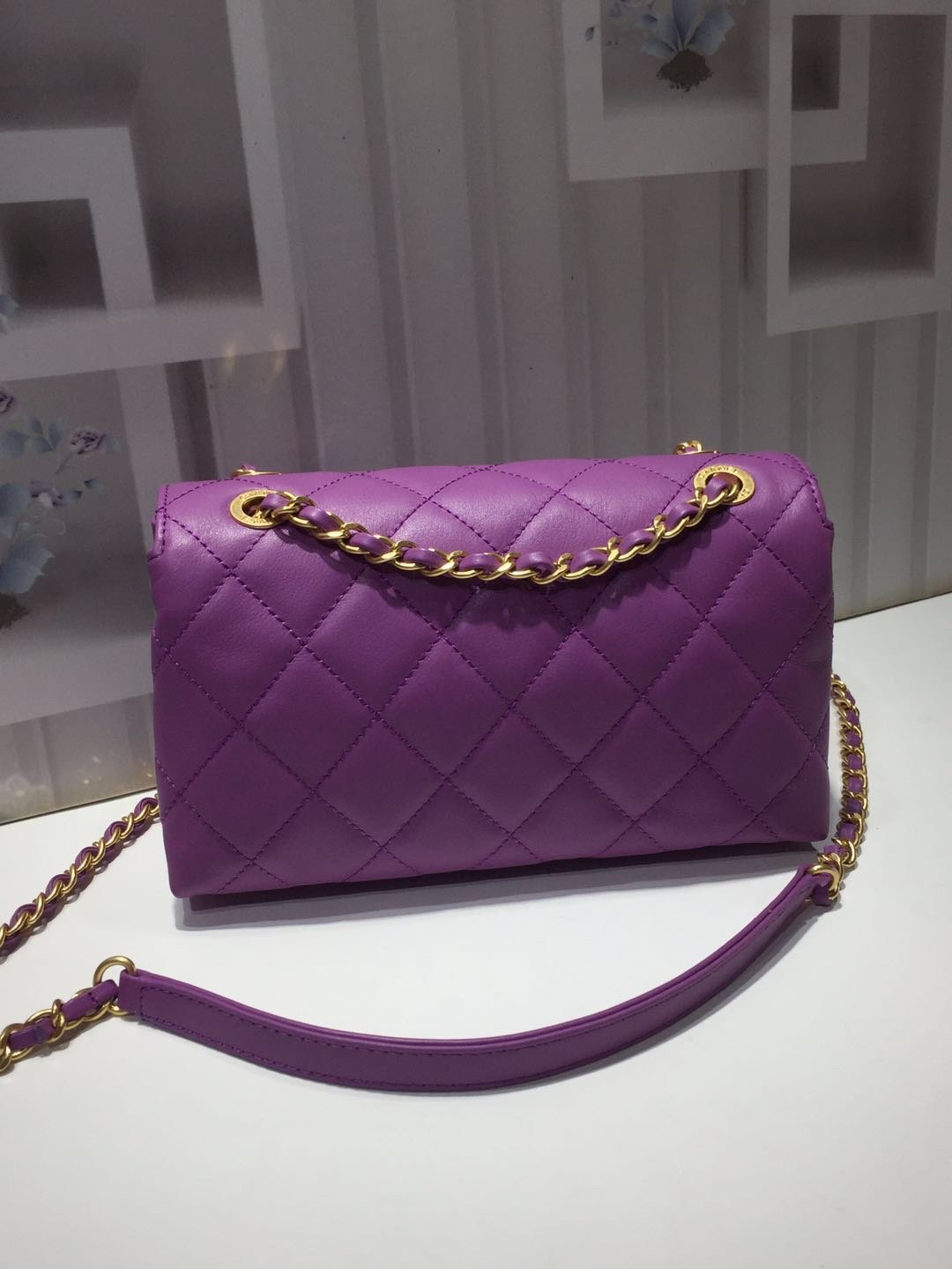 Ch**el small flap bag calfskin goldtone metal purple