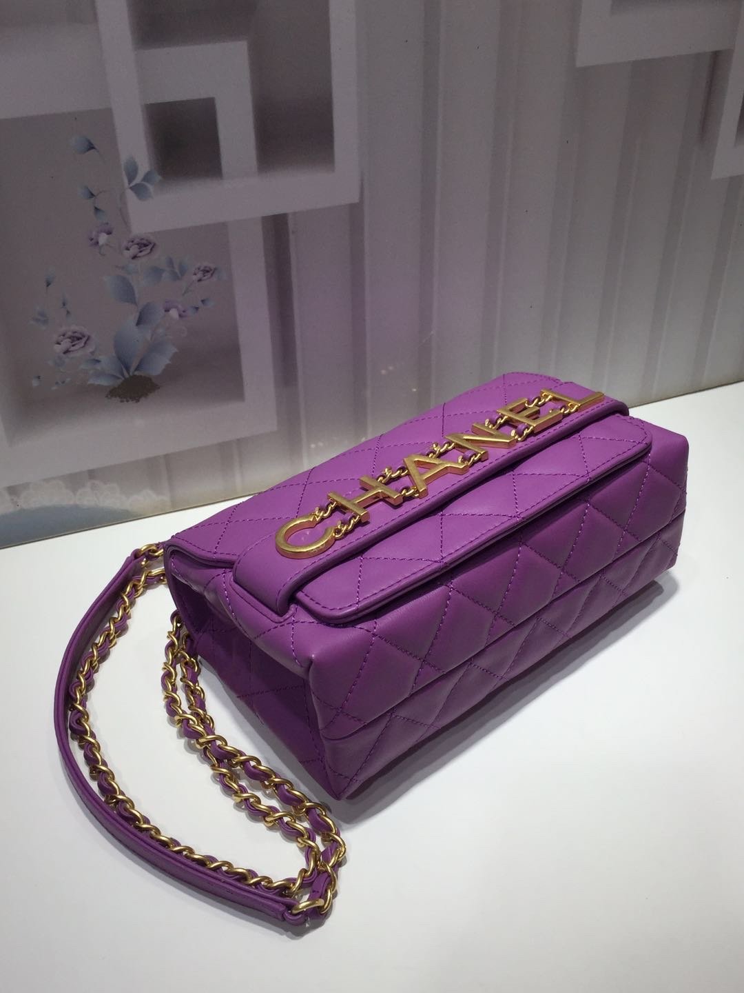 Ch**el small flap bag calfskin goldtone metal purple