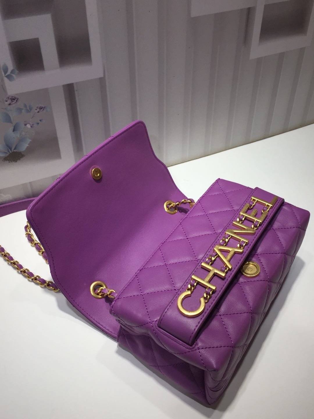 Ch**el small flap bag calfskin goldtone metal purple