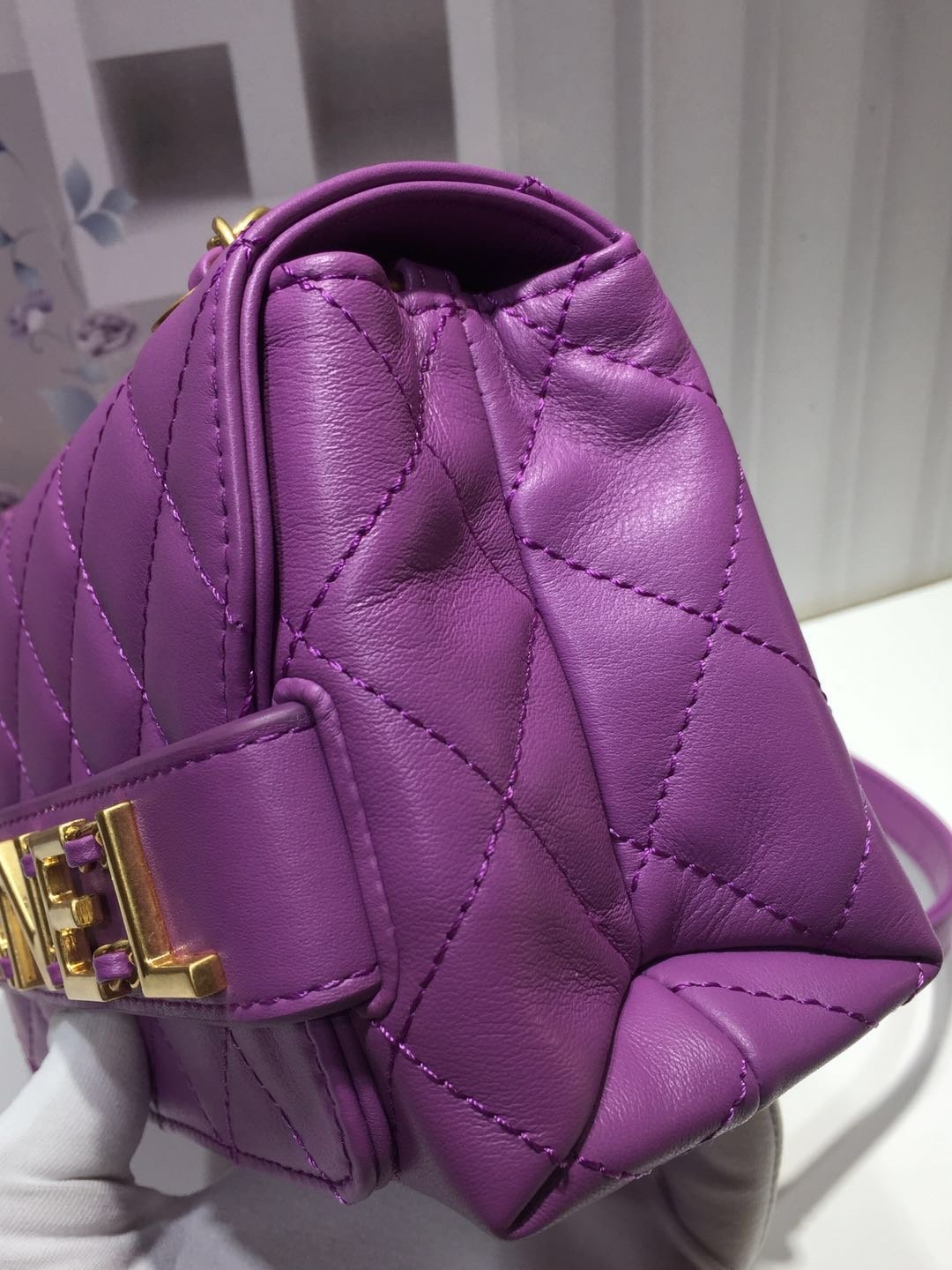 Ch**el small flap bag calfskin goldtone metal purple
