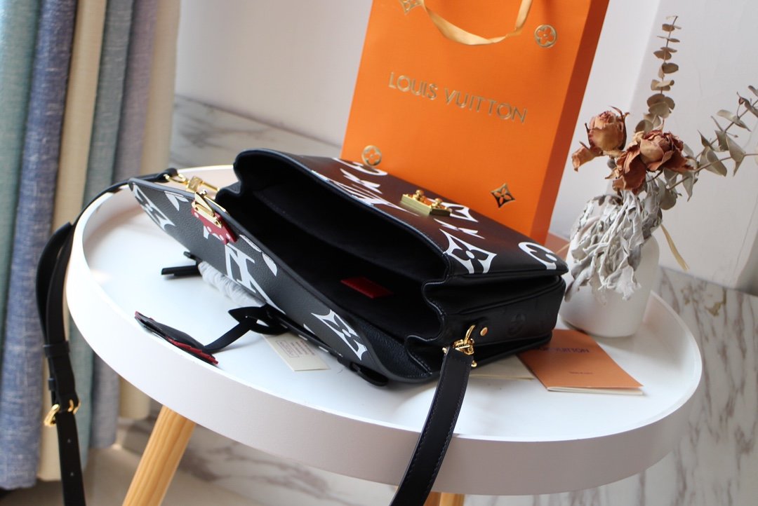 LV Crafty Pochette Metis Monogram Empreinte M45385