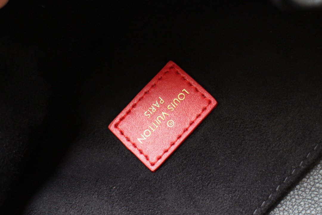 LV Crafty Pochette Metis Monogram Empreinte M45385