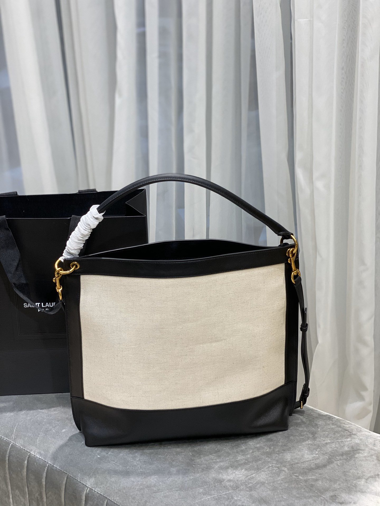 Y51 TAG hobo bag in canvas and leather