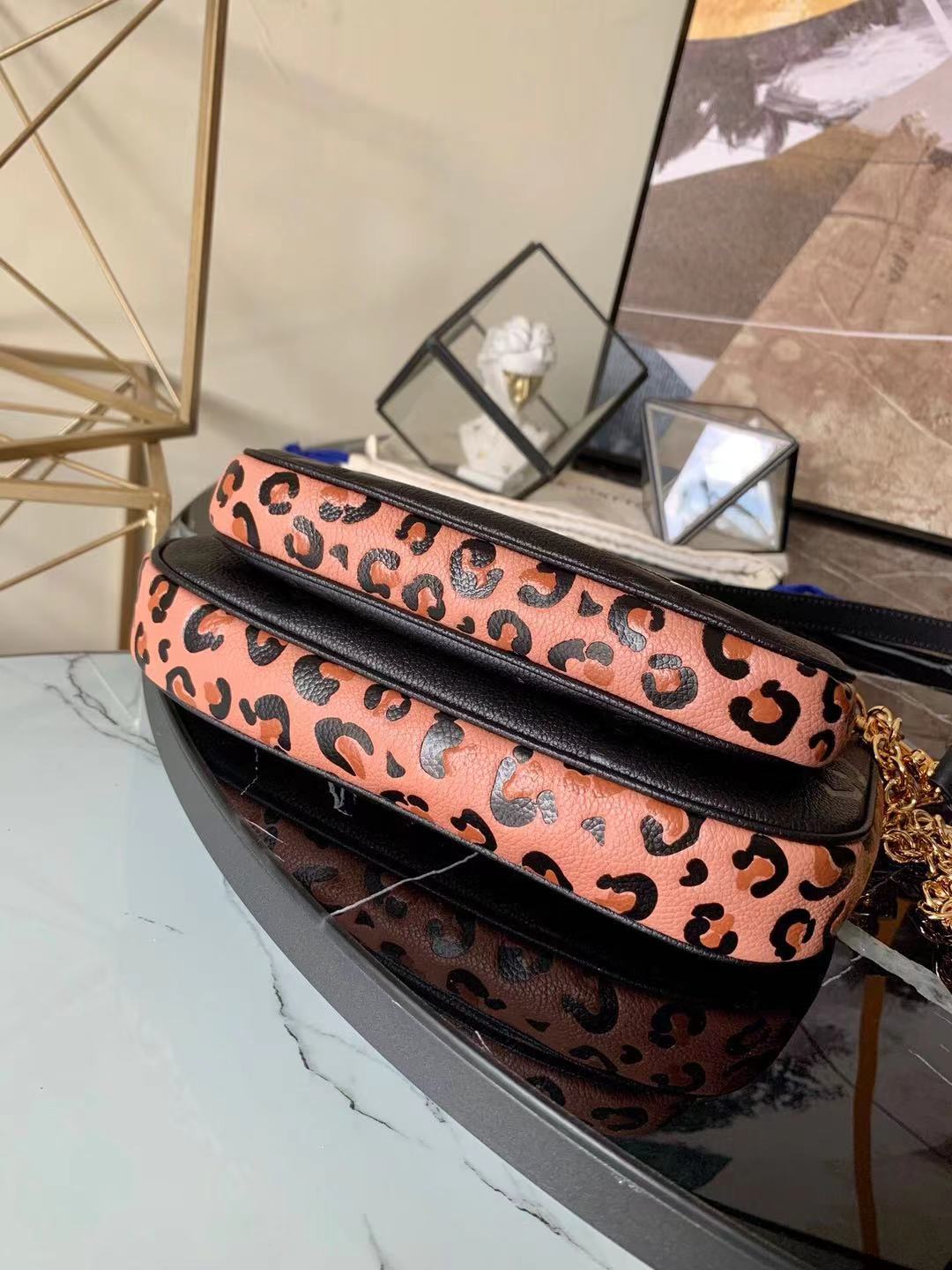 LV Multi Pochette Accessoires Monogram Empreinte M58520