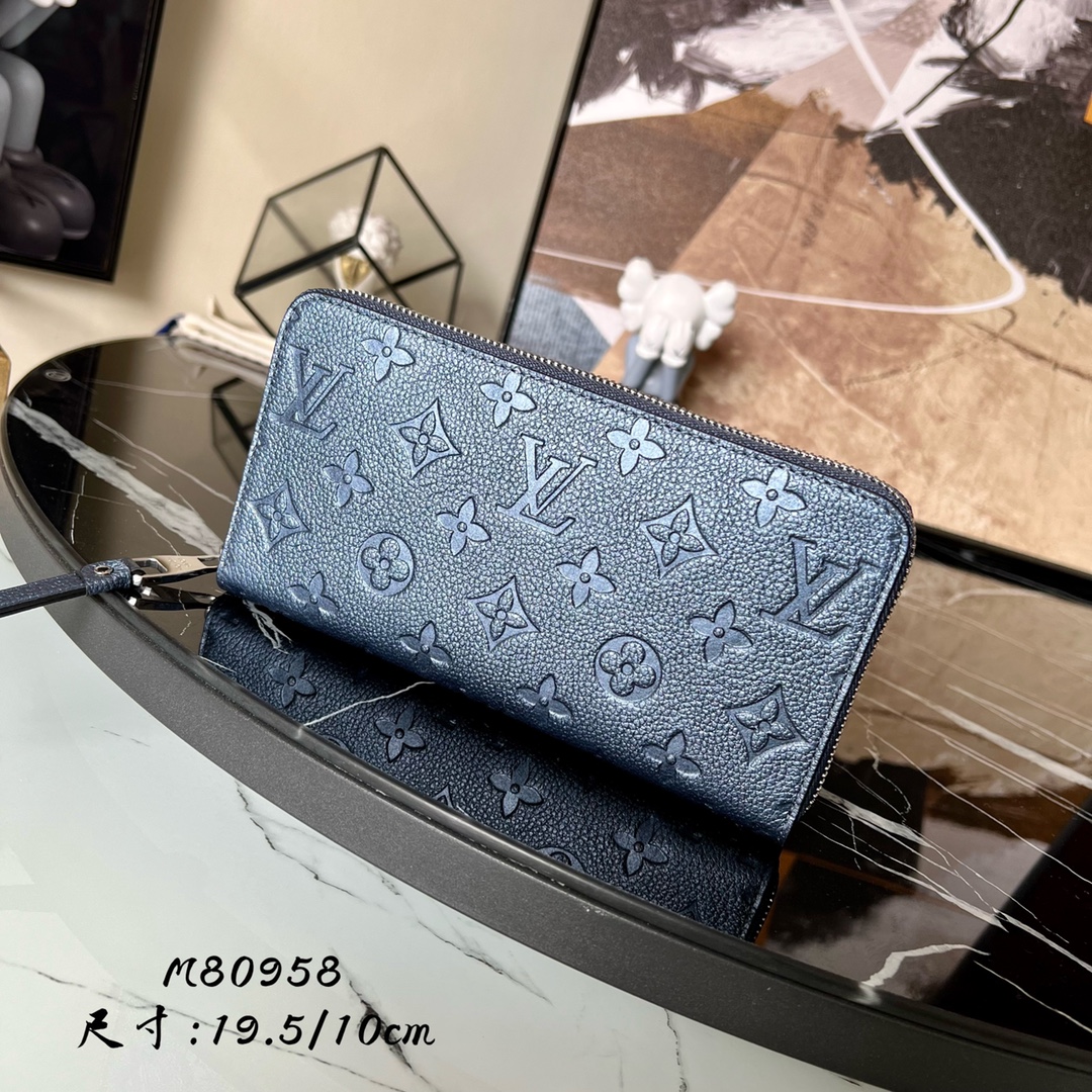 L0vis Vvtt0n Monogram Empreinte Zipper wallet