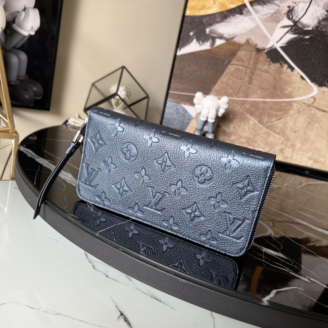 L0vis Vvtt0n Monogram Empreinte Zipper wallet