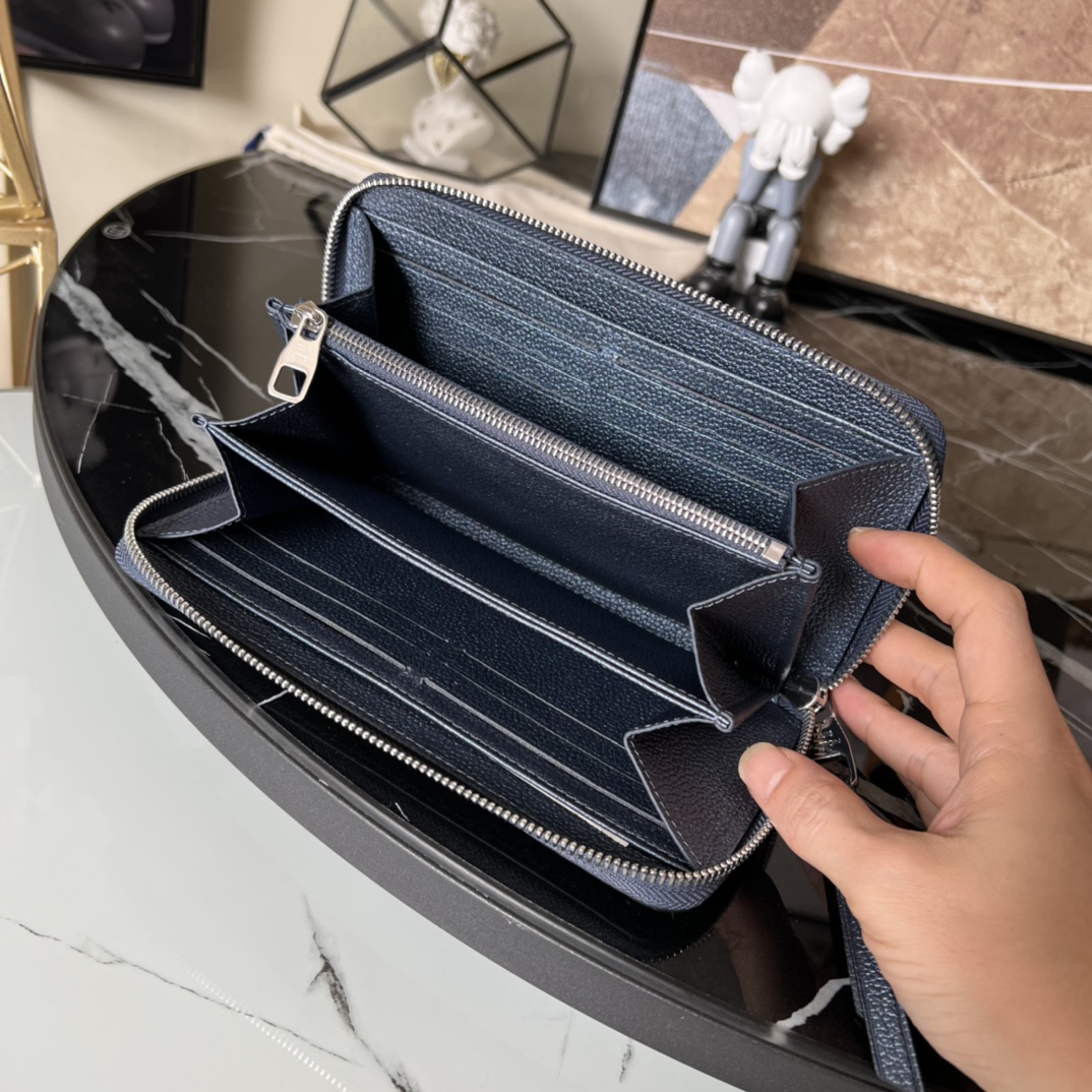 L0vis Vvtt0n Monogram Empreinte Zipper wallet