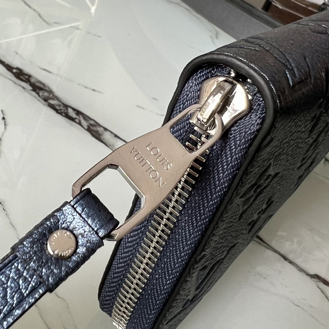 L0vis Vvtt0n Monogram Empreinte Zipper wallet