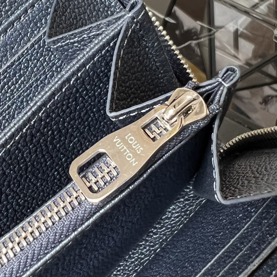 L0vis Vvtt0n Monogram Empreinte Zipper wallet