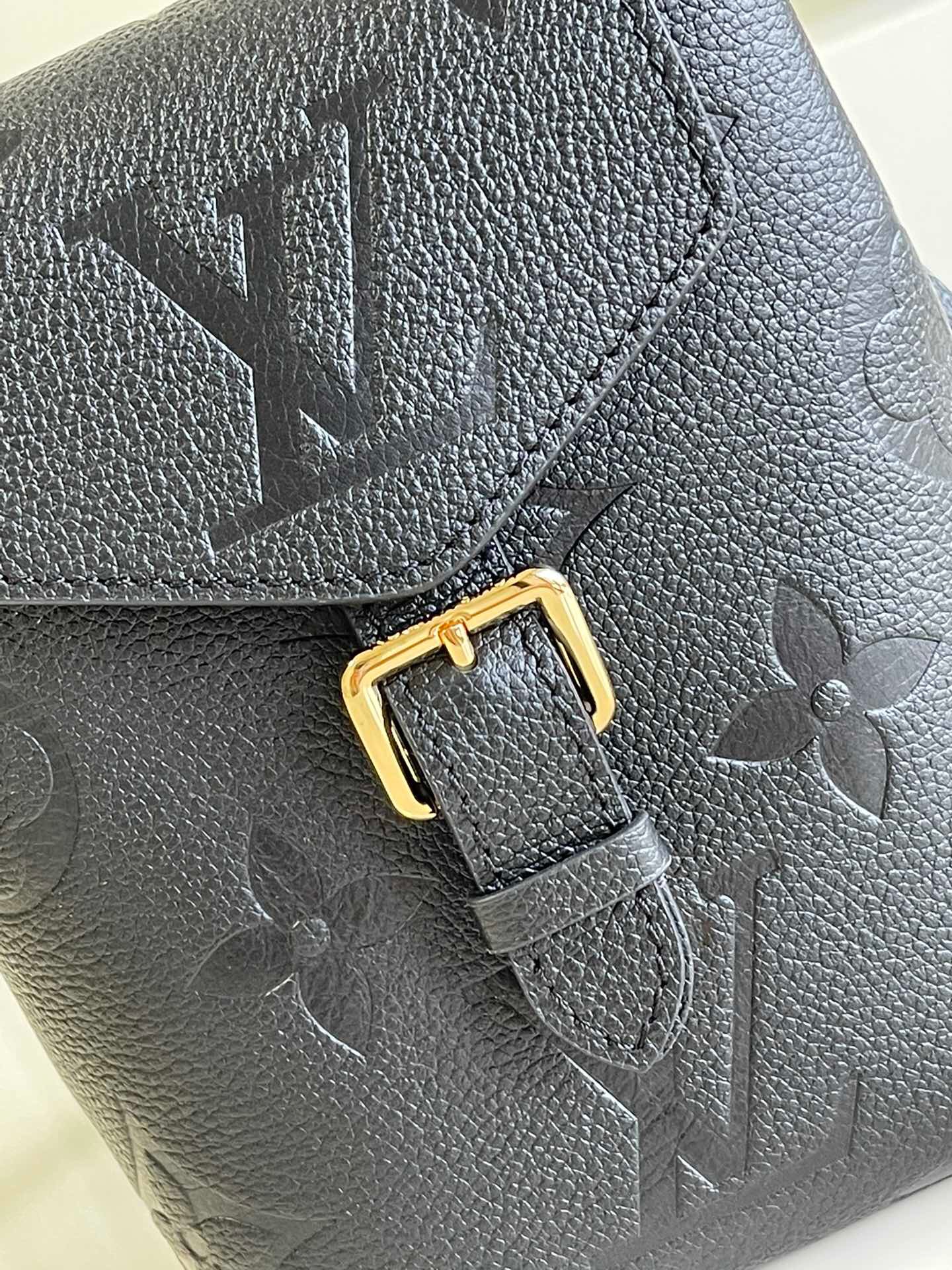 LV Tiny Backpack Bicolor Monogram Empreinte Leather 002