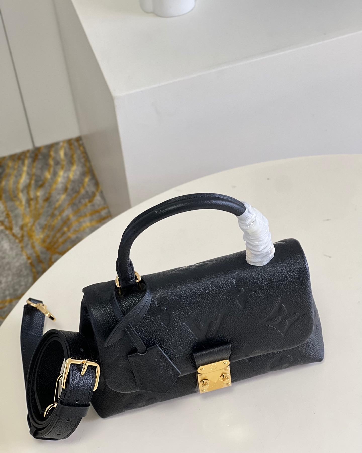 L0vis Vvtt0n Madeleine BB Monogrm Empreinte Bag M46010