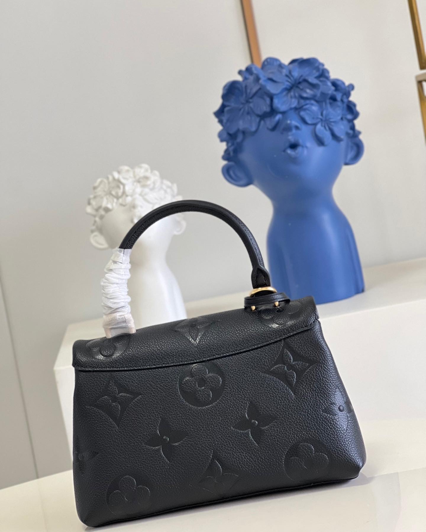 L0vis Vvtt0n Madeleine BB Monogrm Empreinte Bag M46010