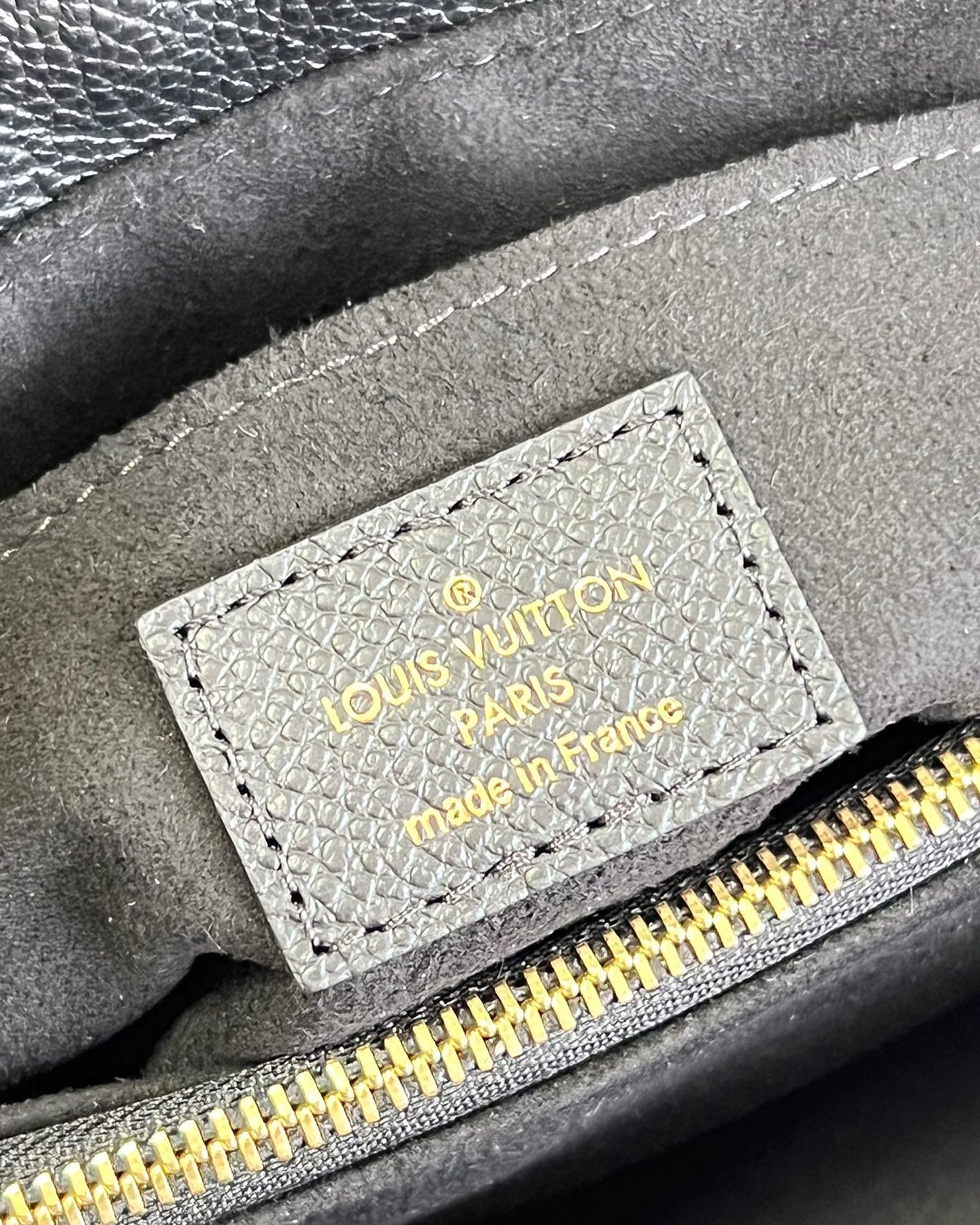 L0vis Vvtt0n Madeleine BB Monogrm Empreinte Bag M46010