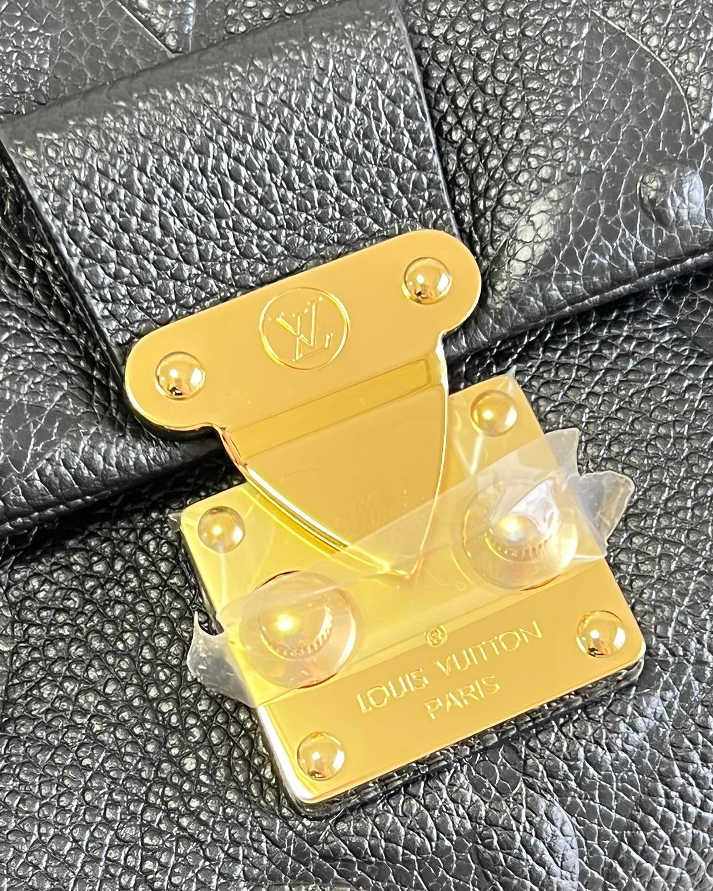 L0vis Vvtt0n Madeleine BB Monogrm Empreinte Bag M46010