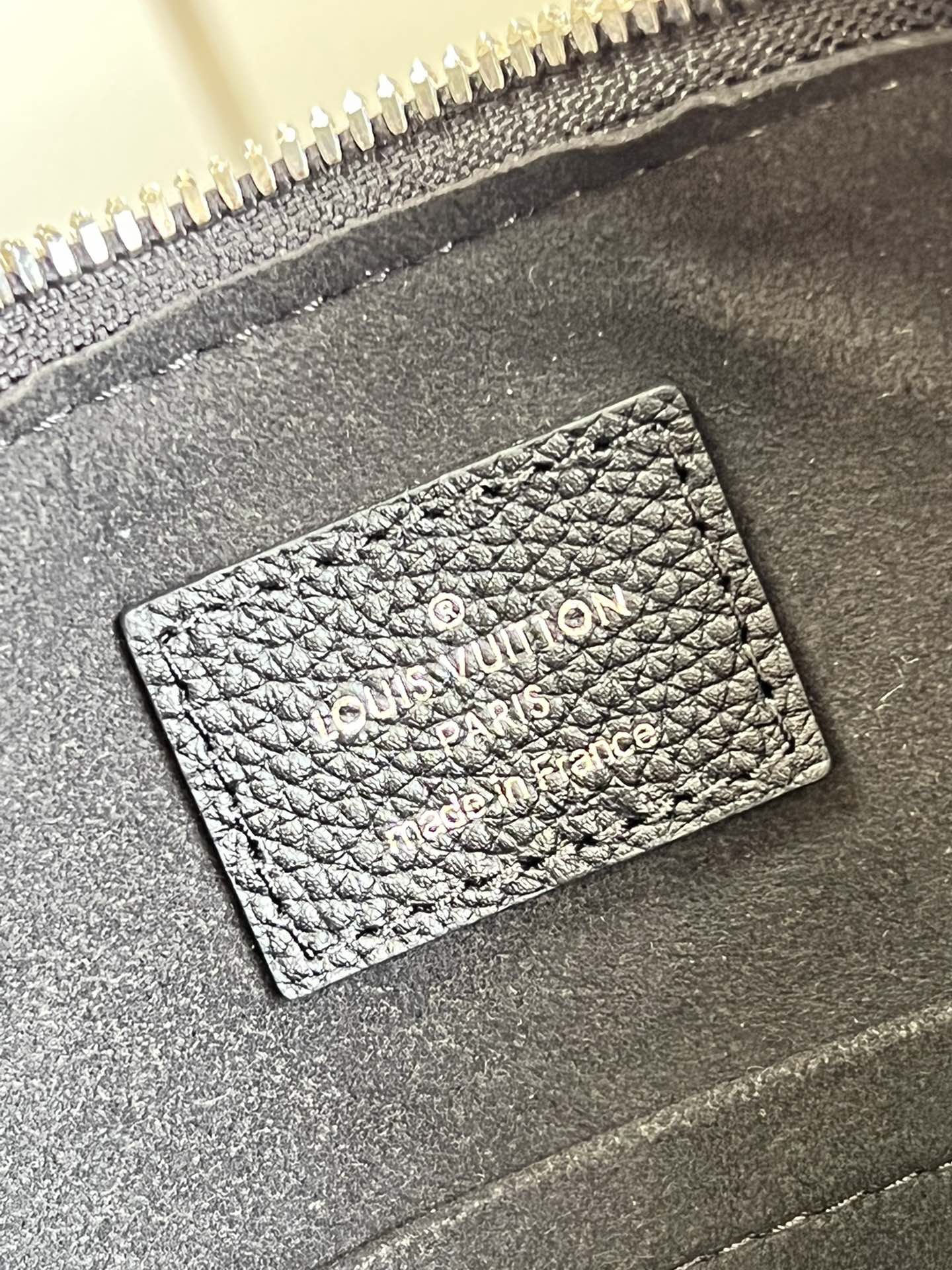 LV WHY KNOT PM BAG M20701