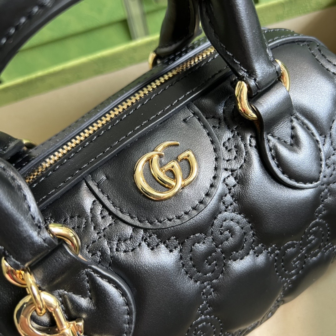 Gvc*1 matelasse leather top handle bag
