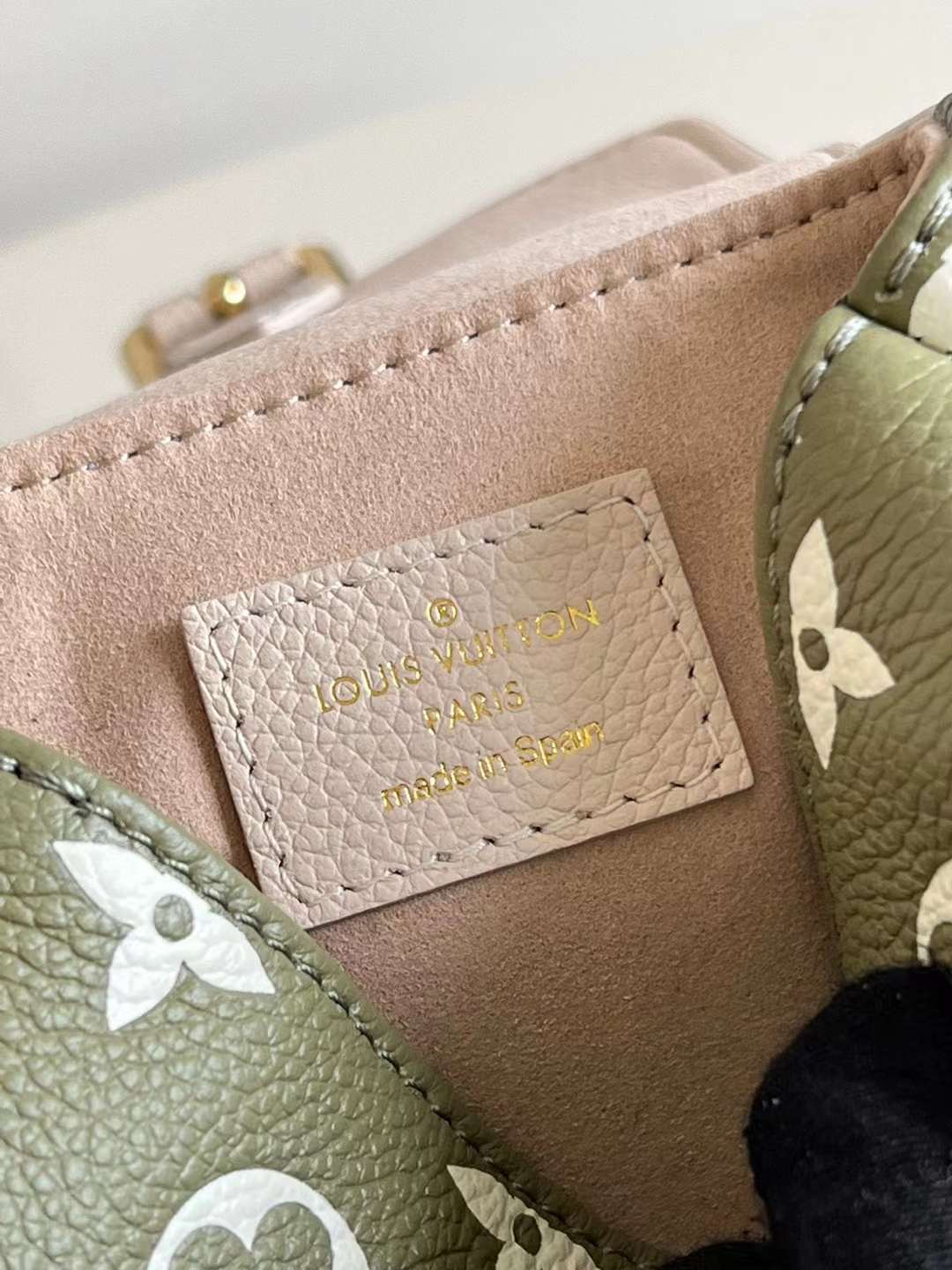 LV Tiny Backpack Bicolor Monogram Empreinte Leather M81351