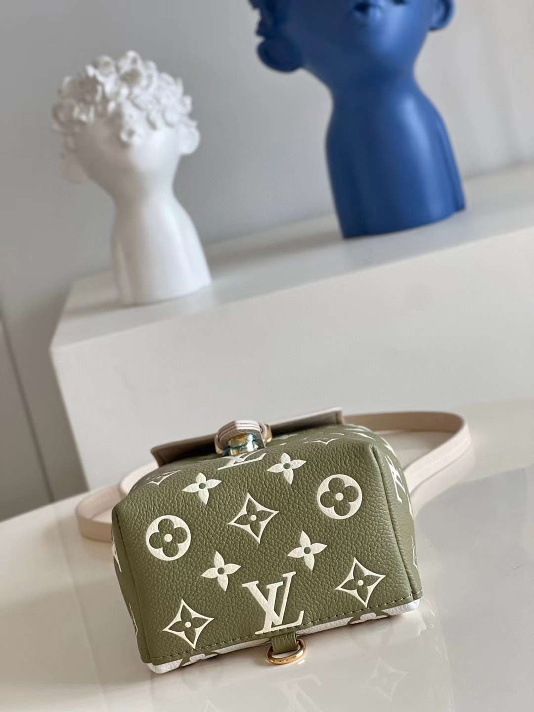 LV Tiny Backpack Bicolor Monogram Empreinte Leather M81351