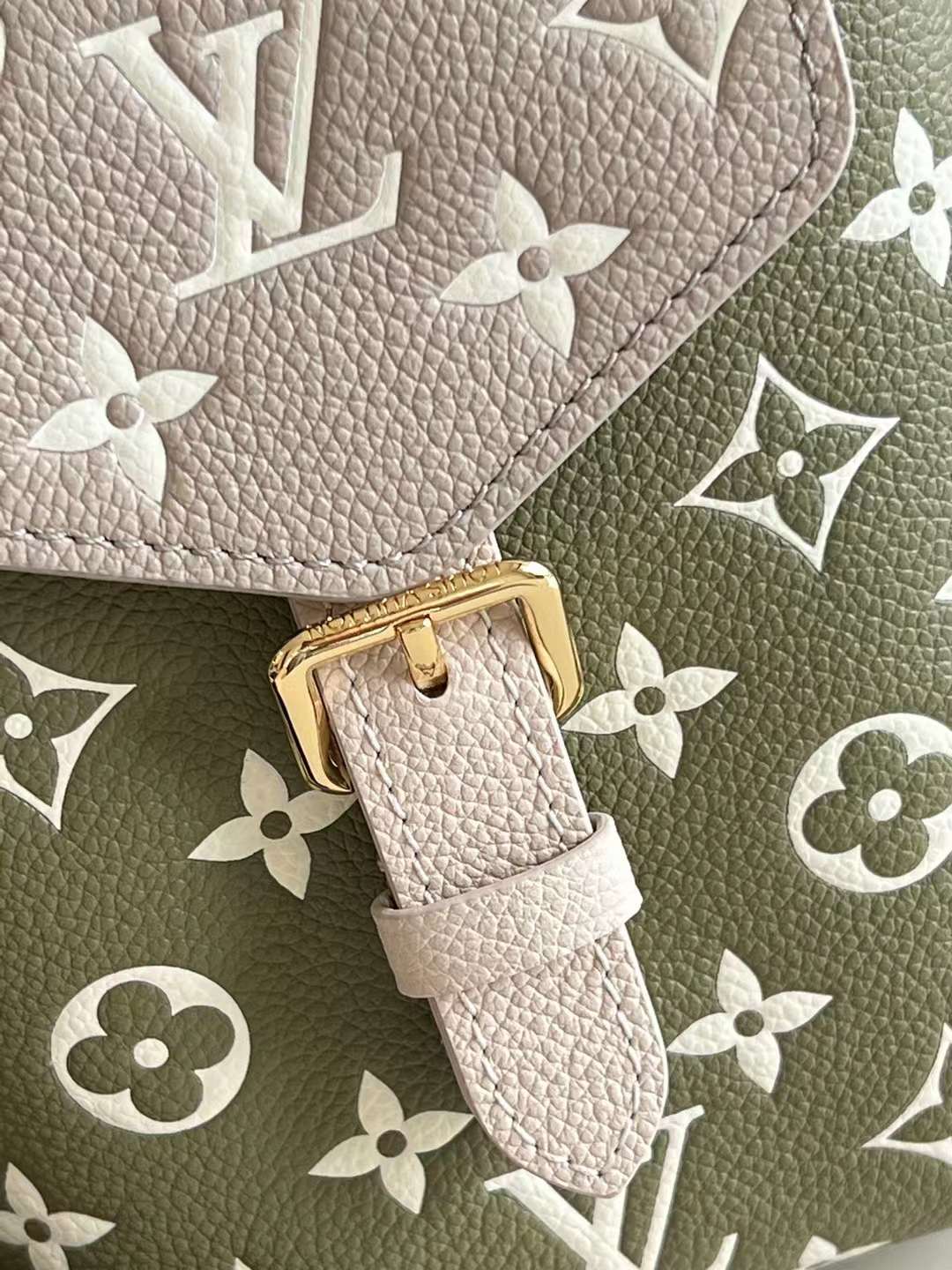 LV Tiny Backpack Bicolor Monogram Empreinte Leather M81351