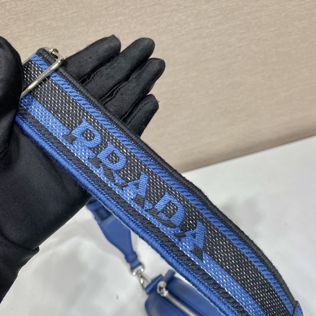 Pra*a Triangle Crossbody Bag 2VH155 Blue