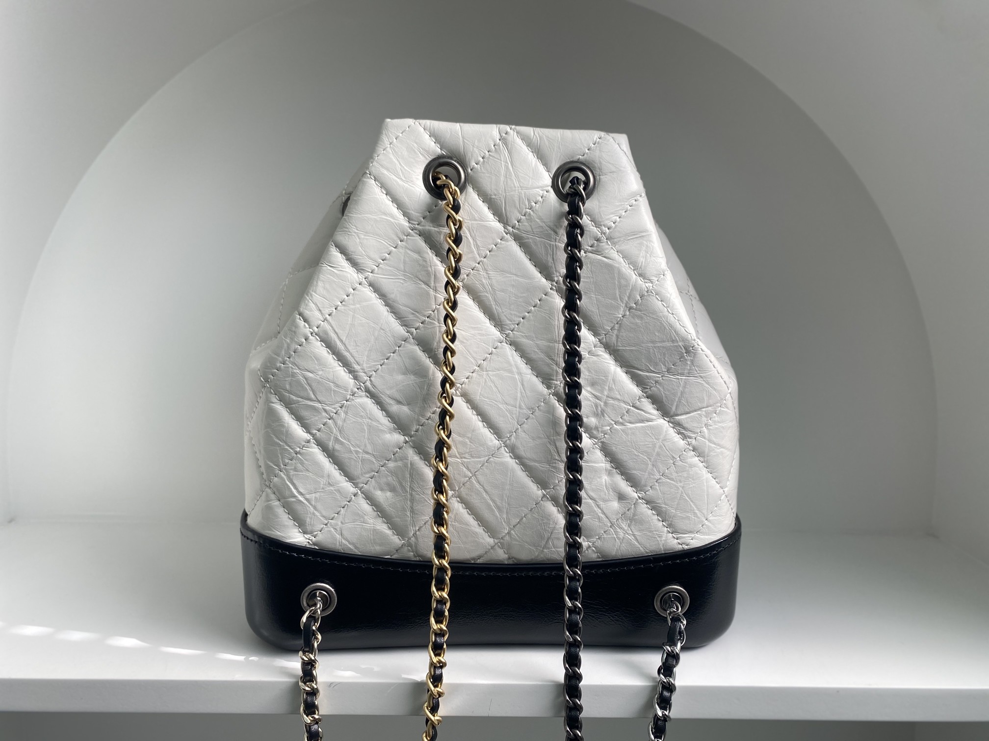 Bagsaaa Ch**el WHITE QUILTED AGED CALFSKIN SMALL GABRIELLE BACKPACK - 26x25x11cm