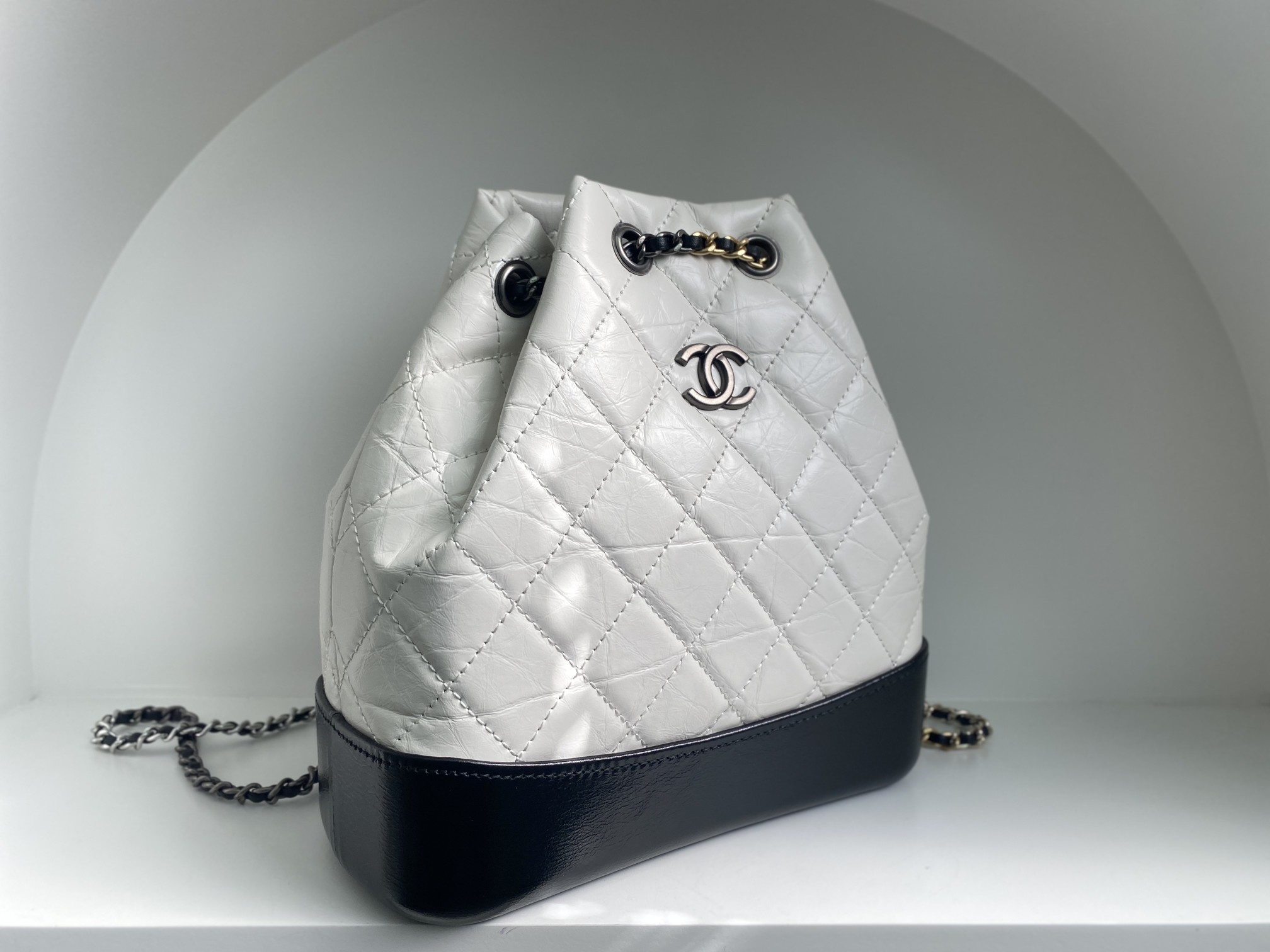 Bagsaaa Ch**el WHITE QUILTED AGED CALFSKIN SMALL GABRIELLE BACKPACK - 26x25x11cm