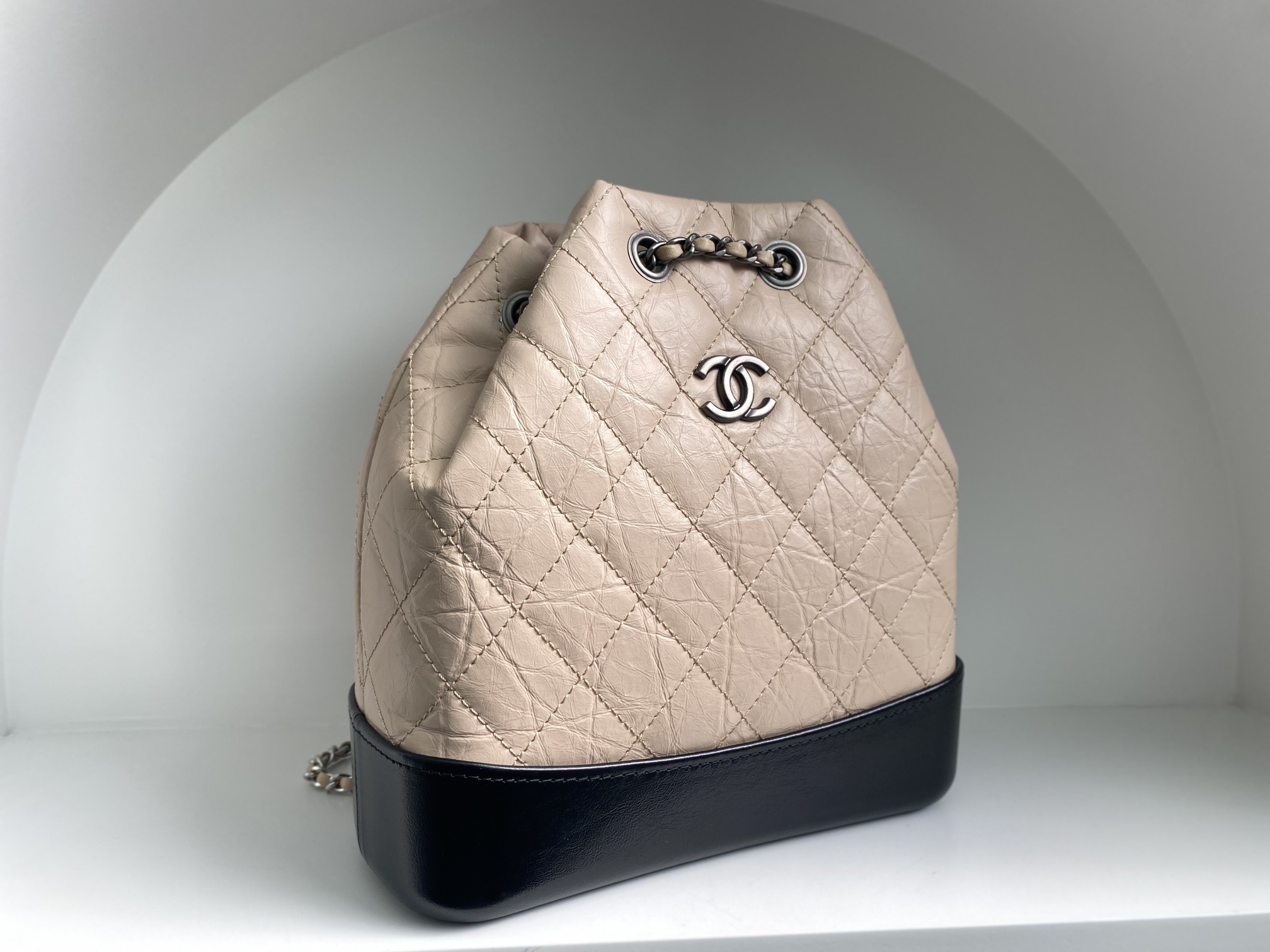 Bagsaaa Ch**el BEIGE QUILTED AGED CALFSKIN SMALL GABRIELLE BACKPACK - 26x25x11cm