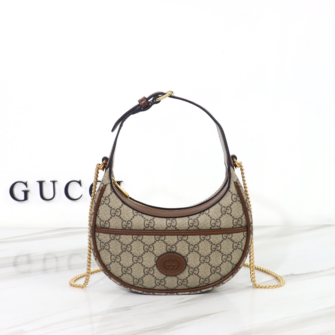 Bagsaaa Gvc*1 GG Half Moon Shaped Mini Bag in Beige and ebony GG Svp*me canvas - 22 x 12.5 x 5cm